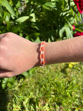 Load image into Gallery viewer, Pastel Orange Daisy Chain Bracelet