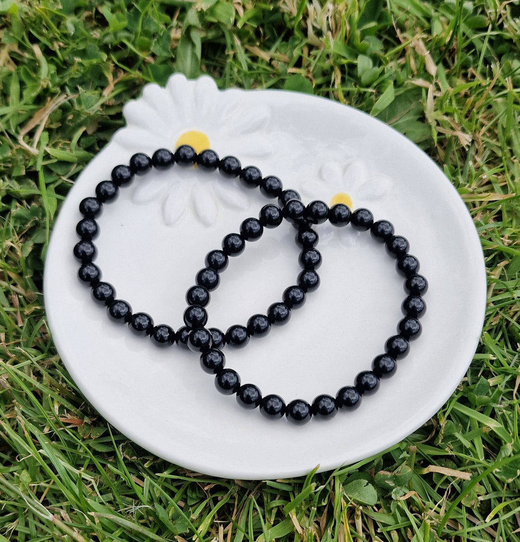 Black Onyx Round Bead Crystal Bracelet